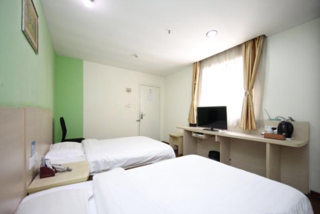 Yixin Business Hotel Kuangcsou Kültér fotó