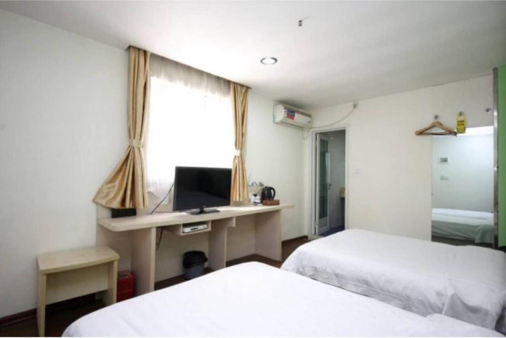 Yixin Business Hotel Kuangcsou Kültér fotó